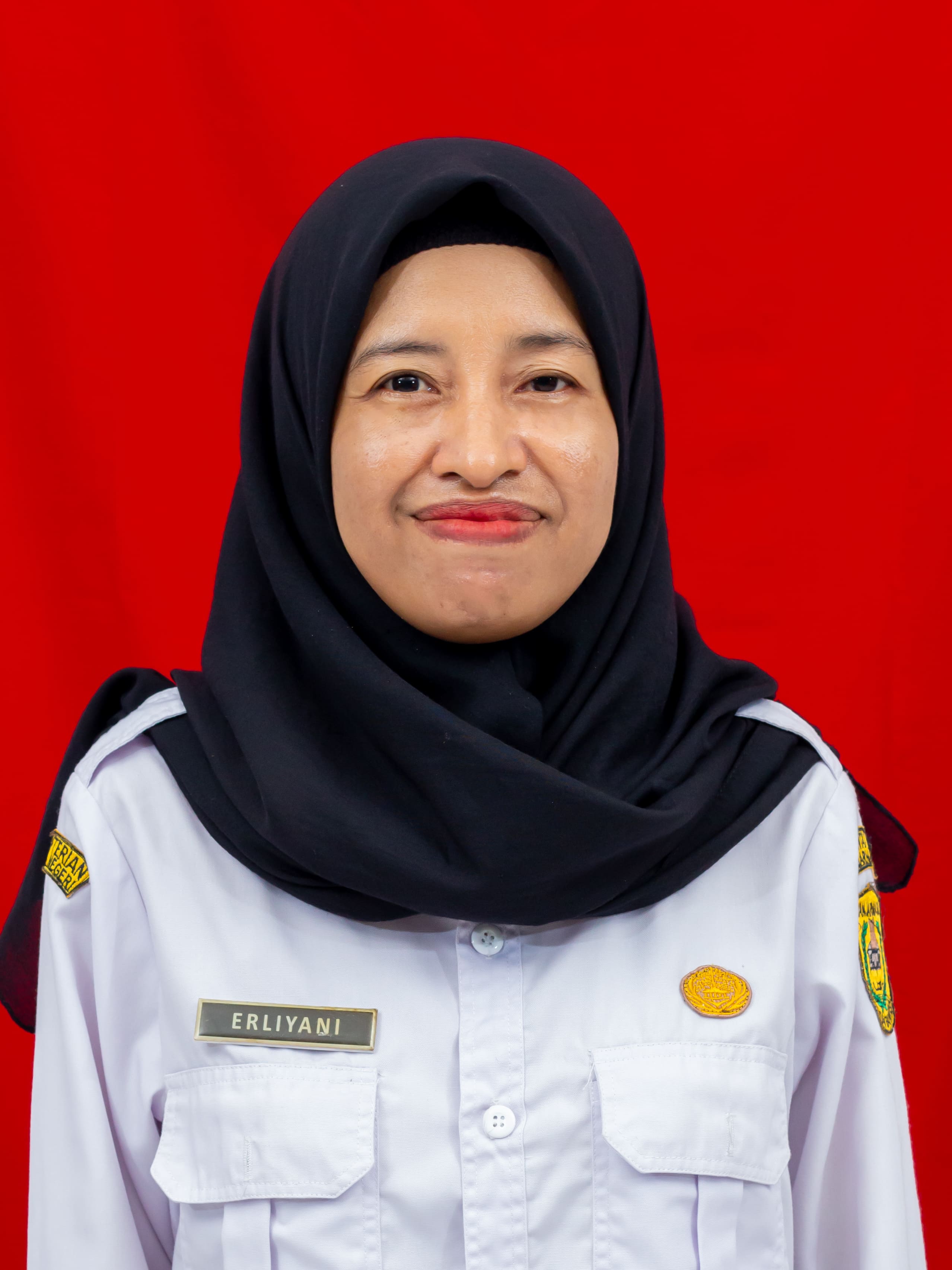Erliyani, SE,S.Pd